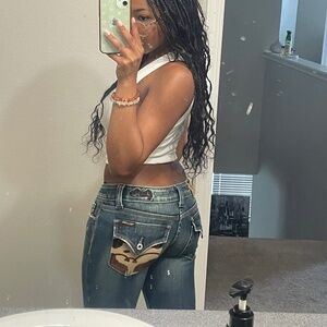 cow print low rise miss me flare jeans